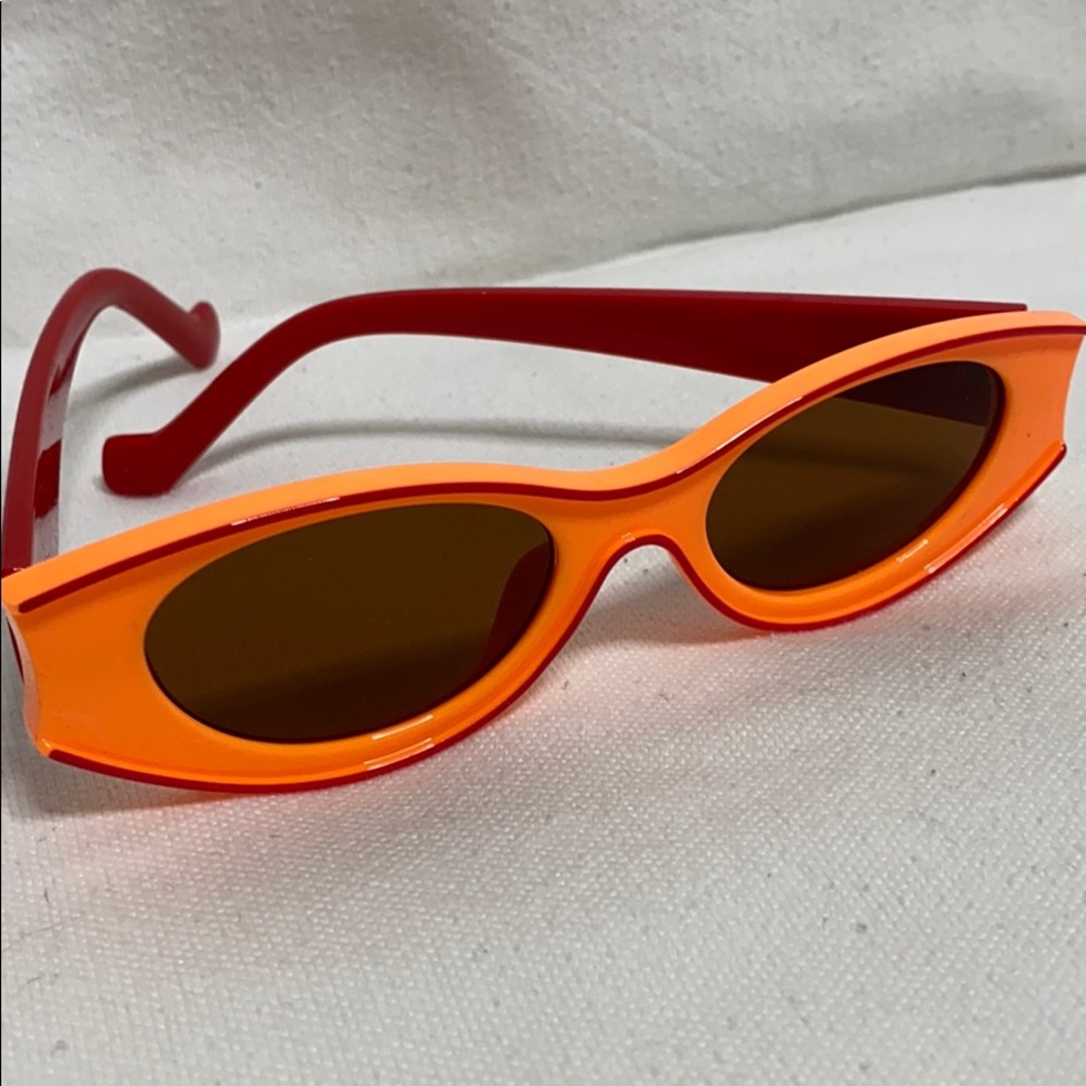 Sunglasses orange and red plastic frames cat eye